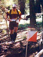 Kelly Wells approaches a boulder control on the Red course at Mt. Pinos, June 2001 (Photo: Joel Thompson, LAOC)