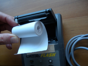<em>GeBe</em> printer, showing how to insert a new paper roll